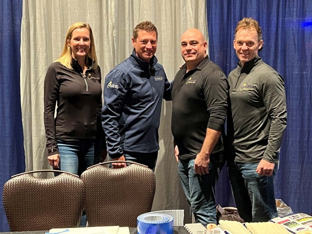 Divine Industrial Team at booth at the MWFP Show 2023